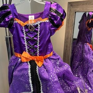 Minnie witch costume orange, black and purple. size 7/8